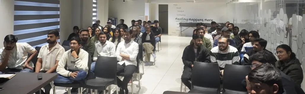 Employee Sitting and Enjoying Auction