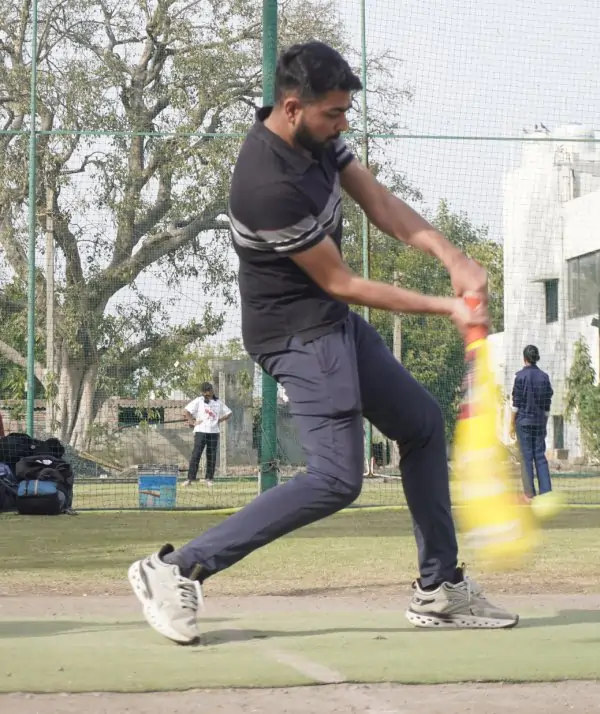 Batsman playing a powerful cover drive
