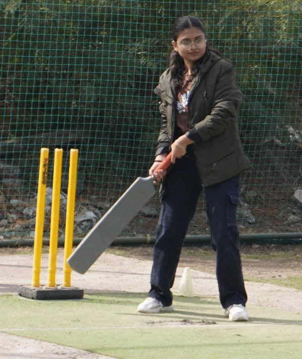 Batsman following through after a strong shot