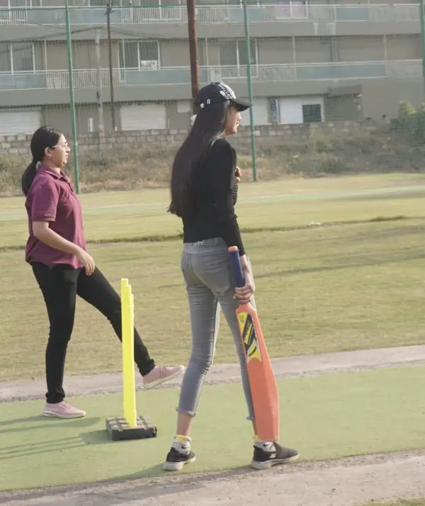 Cricket player attempting a big six