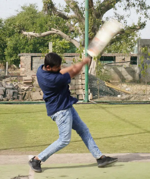 Batsman defending against a fast delivery