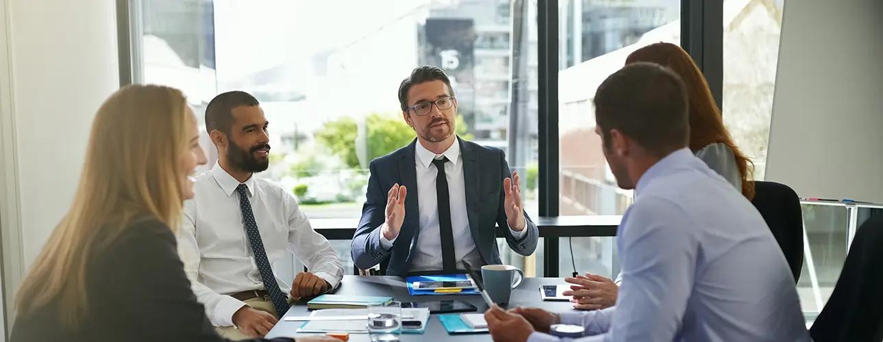 Finance professionals in a business meeting discussing investment strategies, giving feedback, and planning online with teamwork and collaboration.