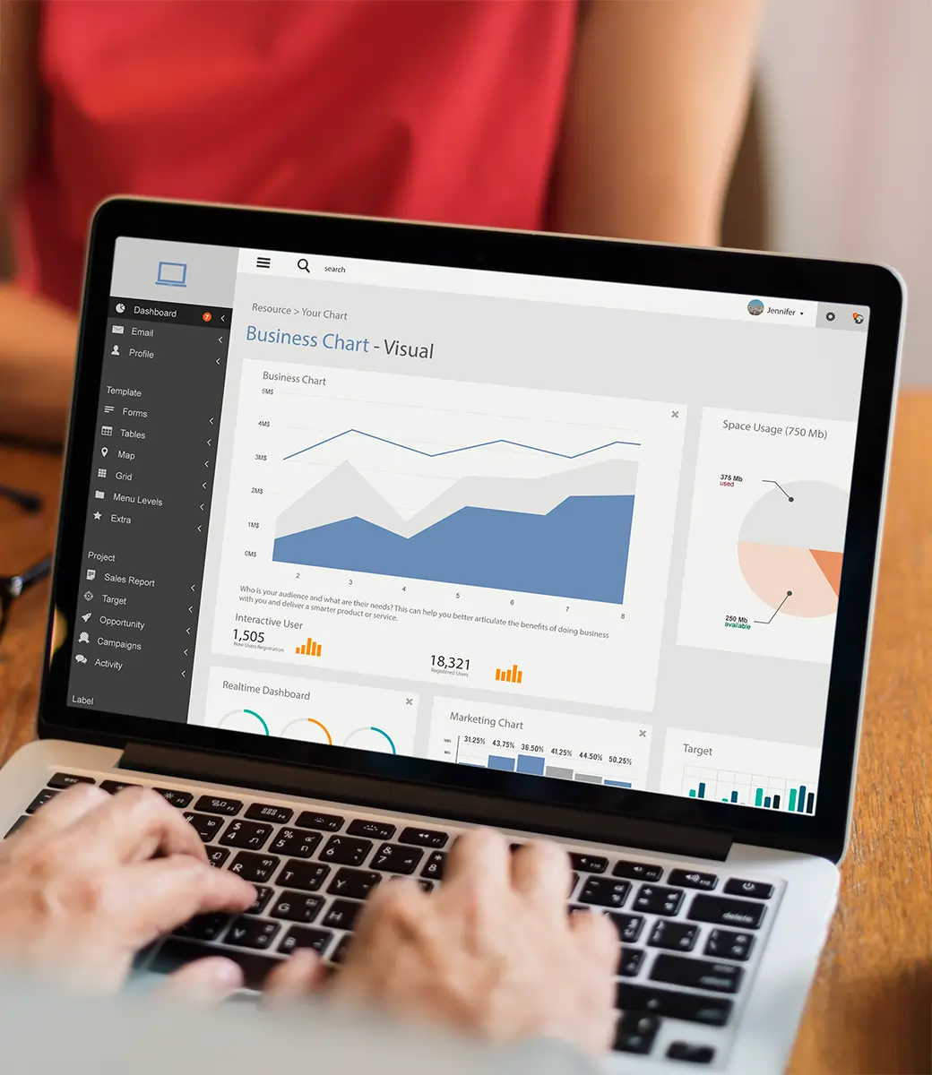 Professionals in an office analyzing financial graphs and data together, representing business planning and Odoo ERP analytics.
