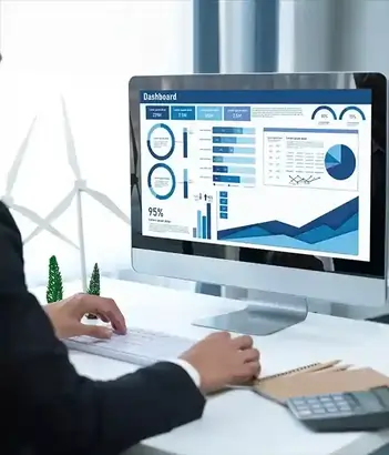 IT company manager viewing business data on an all-in-one IT management system dashboard with integrated business intelligence analytics.