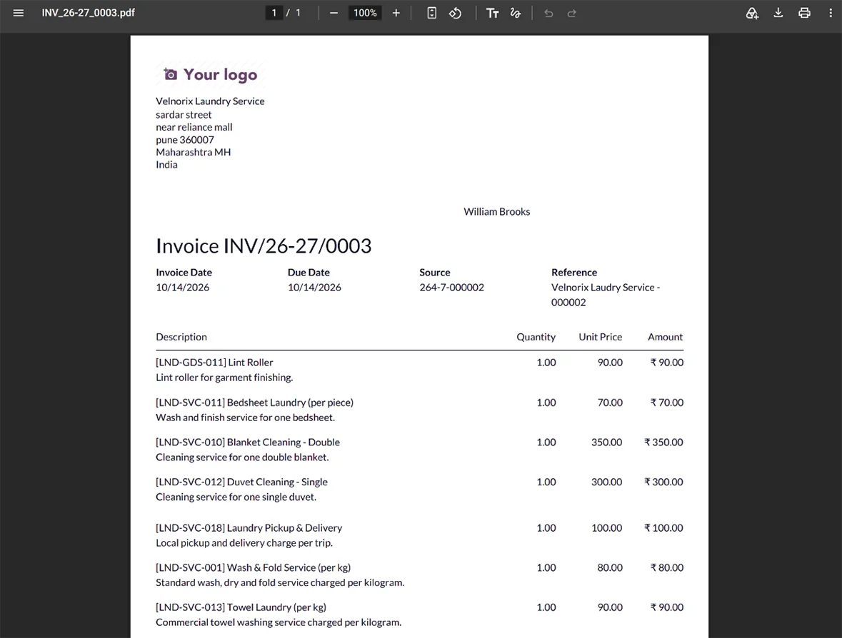 Laundry invoice displaying service details, quantities, prices, taxes, and total